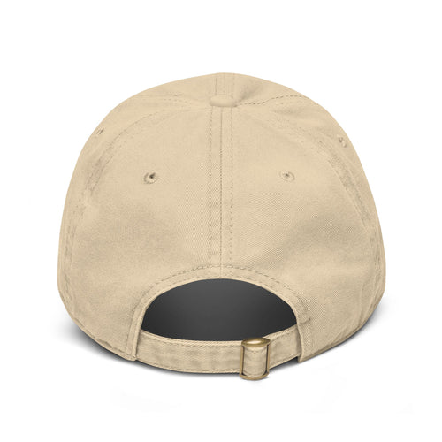 Back view of The Colony - Vintage Washed Cap in beige with buckle closure, showcasing its vintage style.